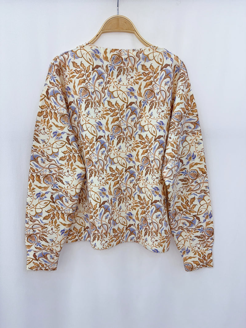 Beige gebreide trui met bloemenprint – stijlvolle en comfortabele keuze