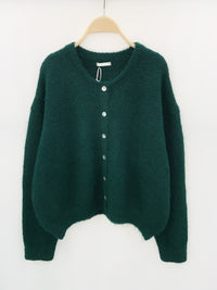 Elegant groen vest met knopen – Luxe stijl en verfijnde uitstraling.