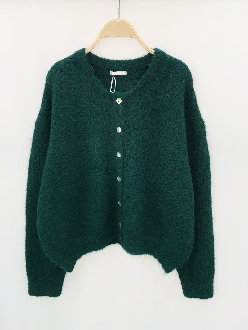 Elegant groen vest met knopen – Luxe stijl en verfijnde uitstraling.
