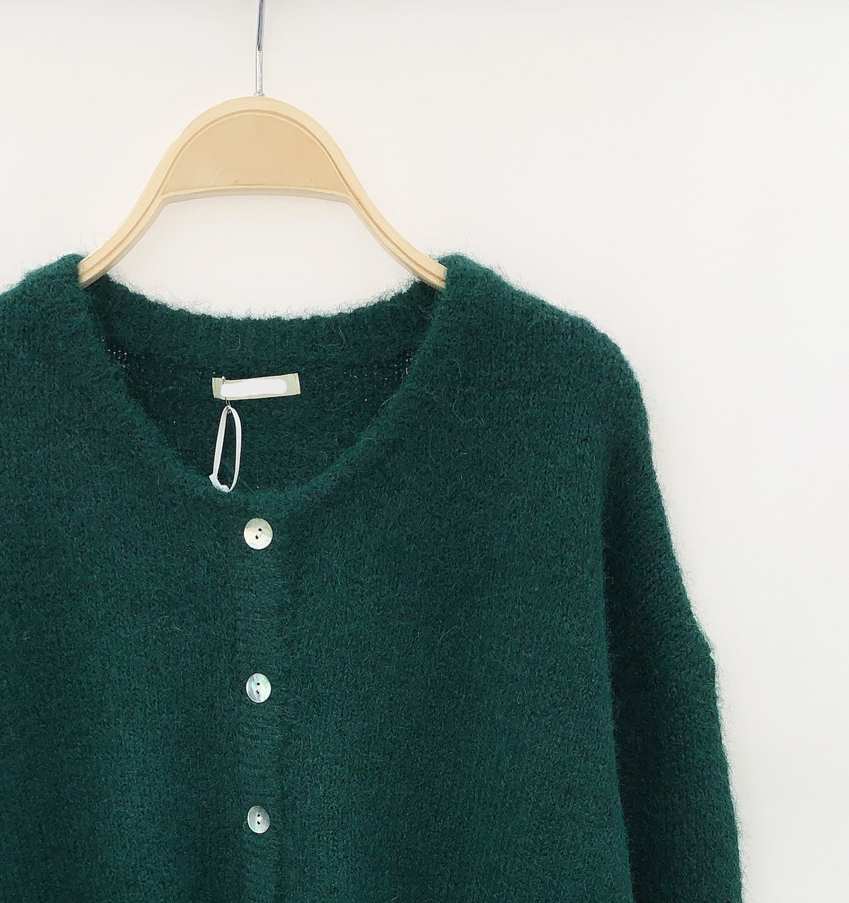 Detail van groen vest – Premium stof voor een luxe pasvorm.