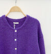 Detail van het paarse vest – Zachte premium stof voor optimaal comfort.